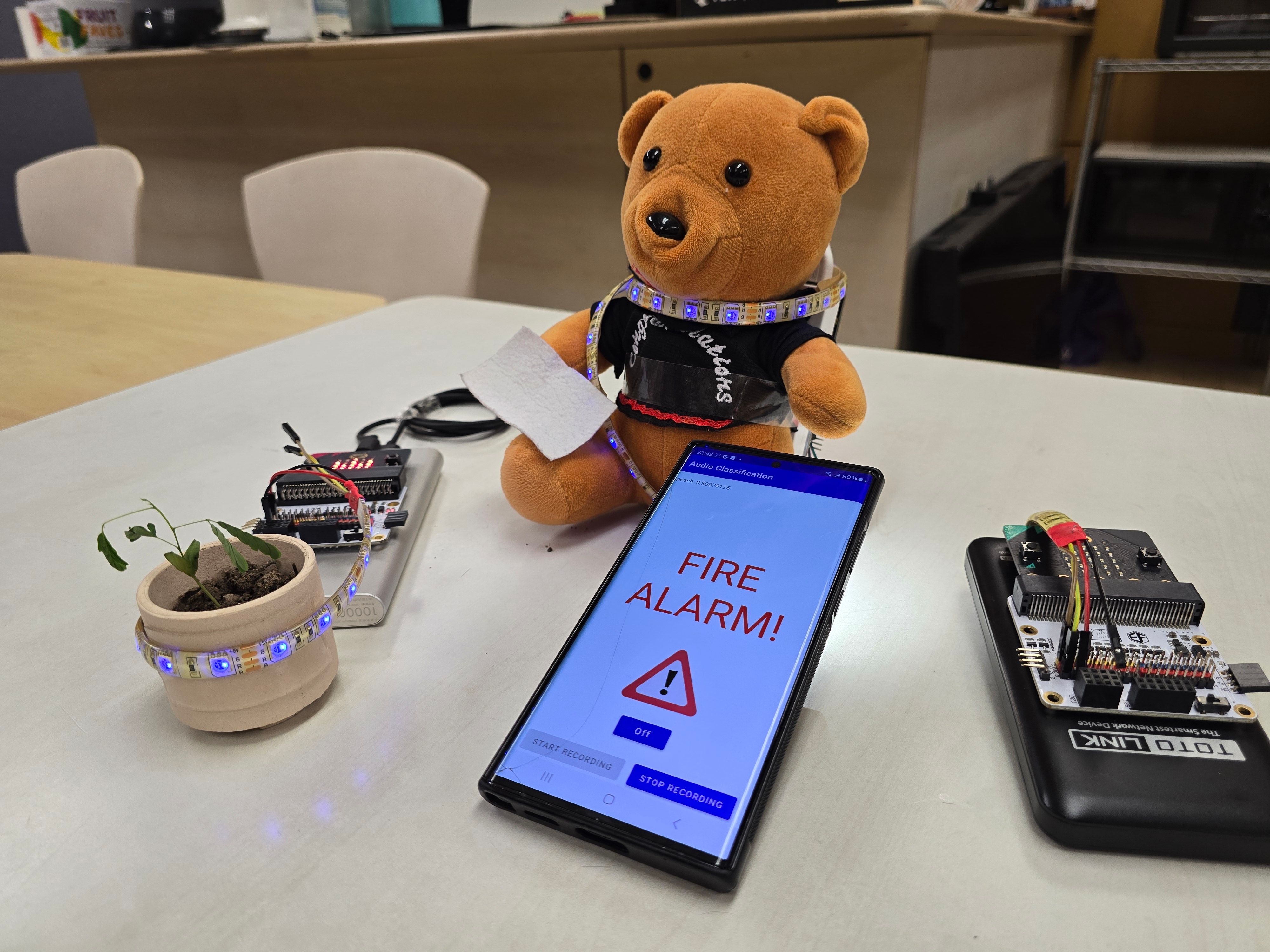 A Teddy bear and smart phone demonstrate how the &quot;Wish to Hear the Sound&quot; prototype works.
