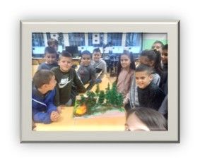 Students pose with their project.