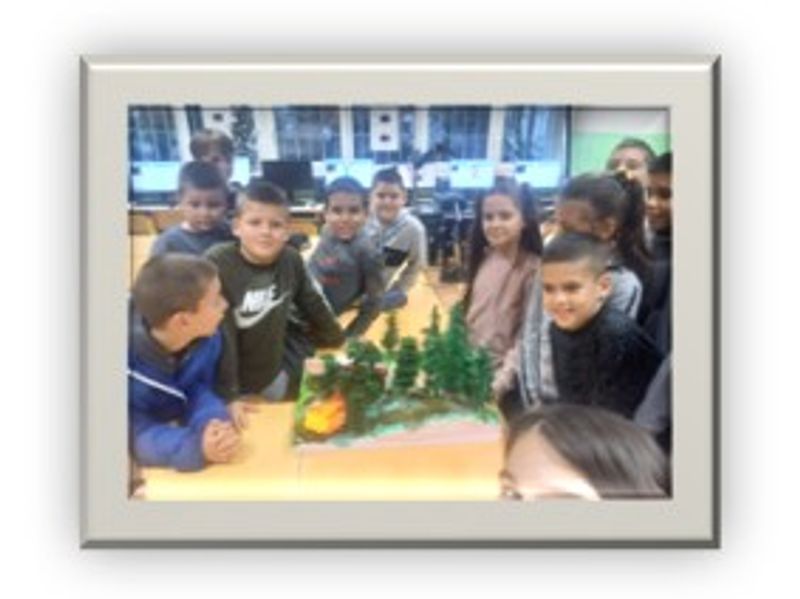 Students pose with their project.