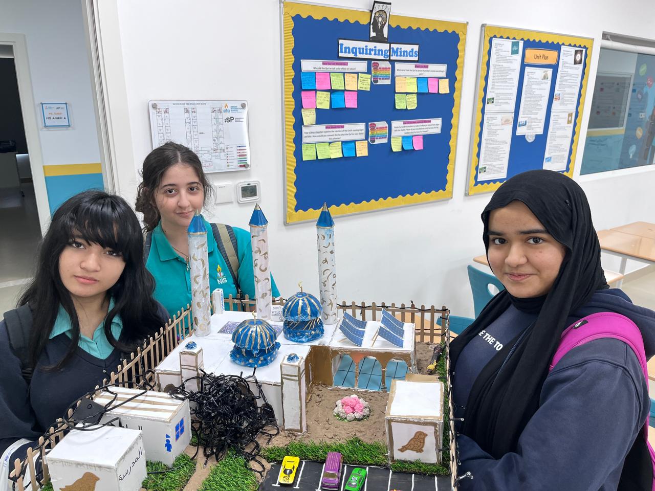 Students present the eco-friendly mosque prototype.