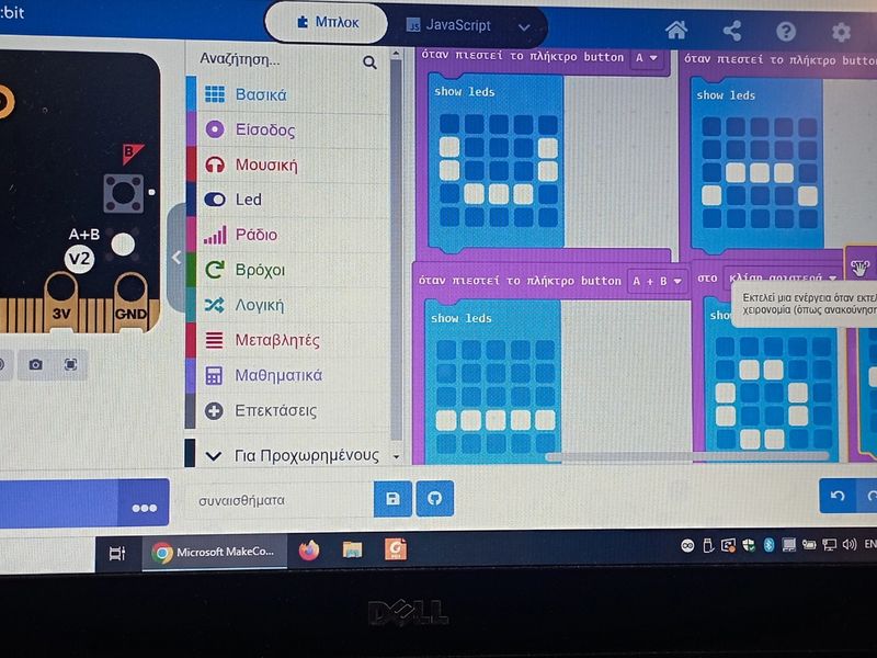 Photograph of computer screen showing student's work on MakeCode.