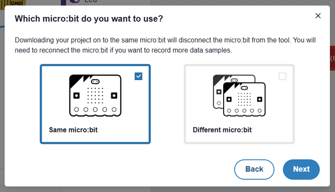 Screenshot of the download popup asking which microbit do you want to use and the information: Downloading your project on to the same micro:bit will disconnect the micro:bit from the tool. You will need to reconnect the micro:bit if you want to record more data samples.