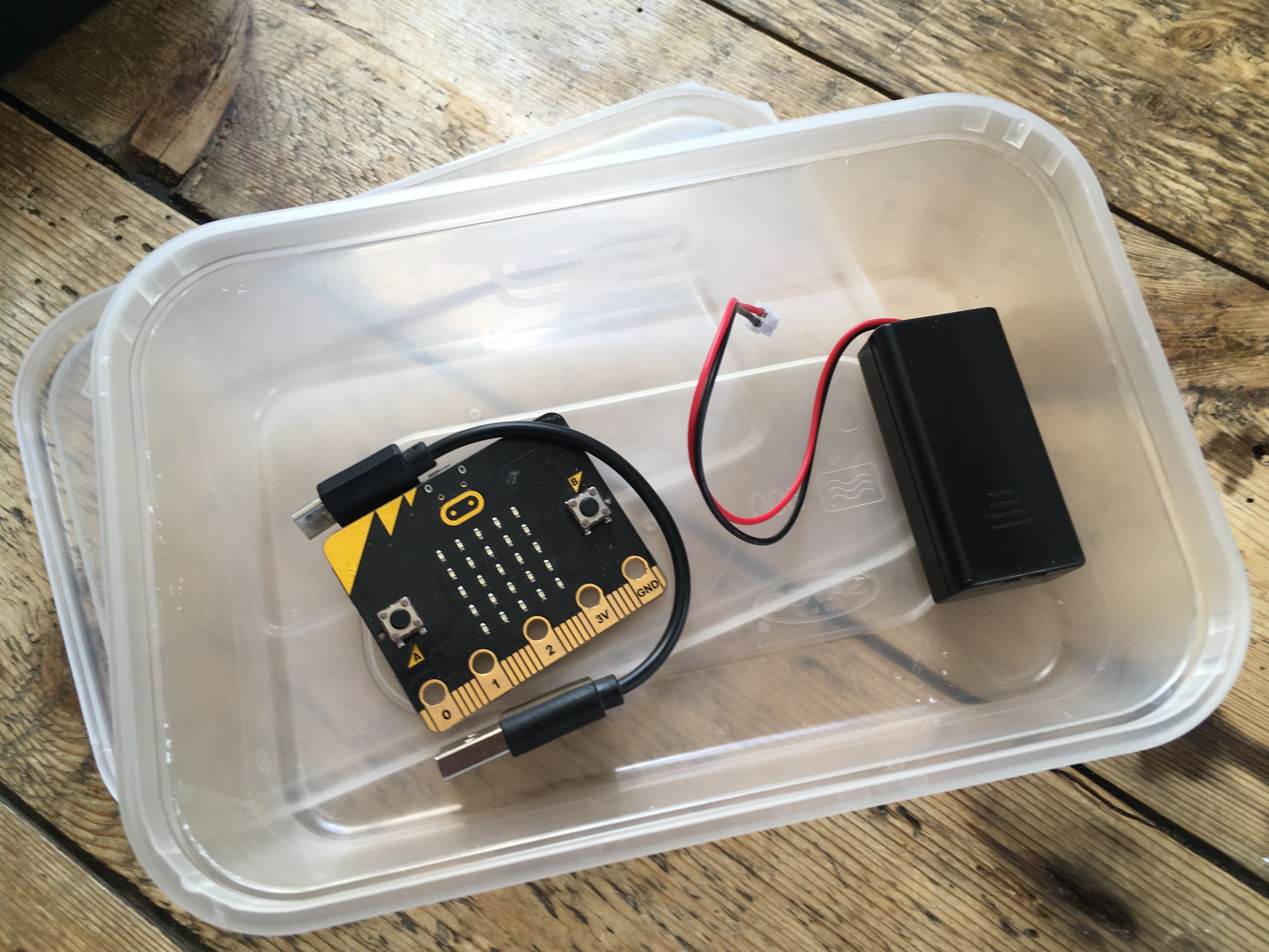 micro:bit stored in inexpensive food container