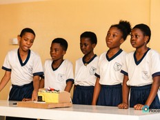 Students with earthquake life saver bed project.