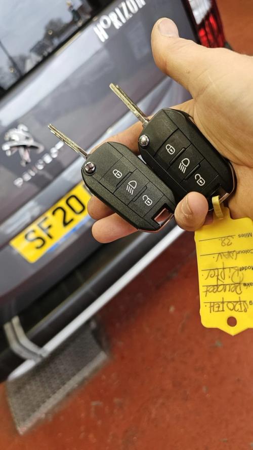 Peugeot Rifter car key (spare key) by Lock City in Bathavon South