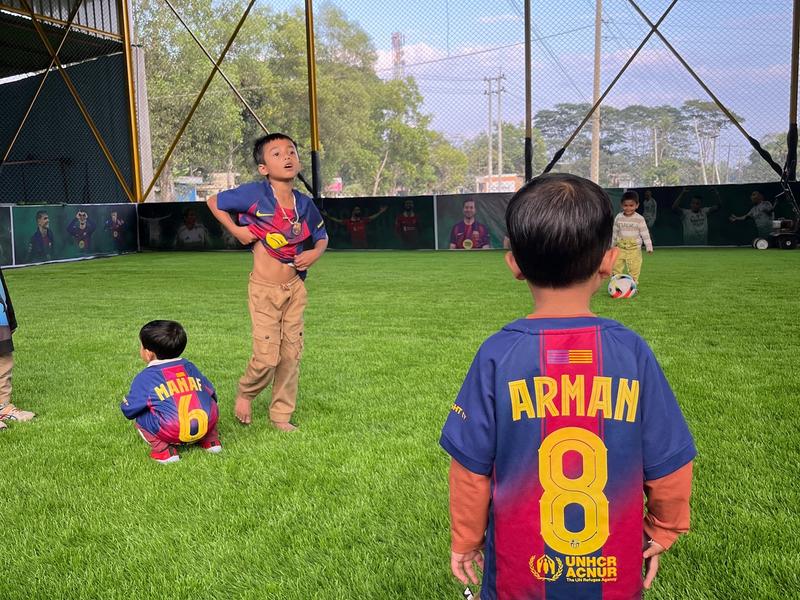 A wide-angle view of the entire well-lit indoor football pitch at Prime Arena.