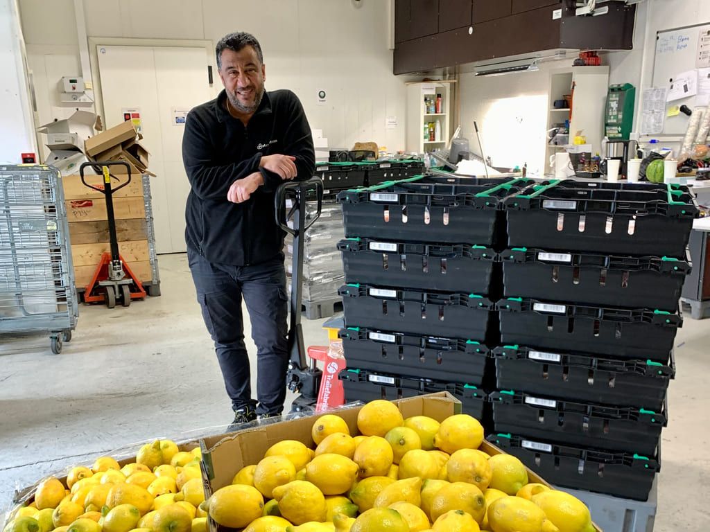 Sala works as a driver and warehouse assistant at Matsentralen Oslo. Here he is photographed in the warehouse