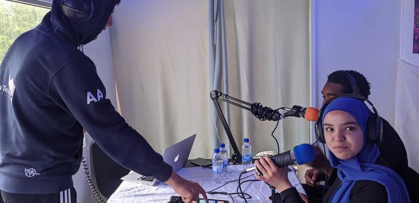 Three young people recording a podcast at the Framtidsverkstaden in Uppsala.