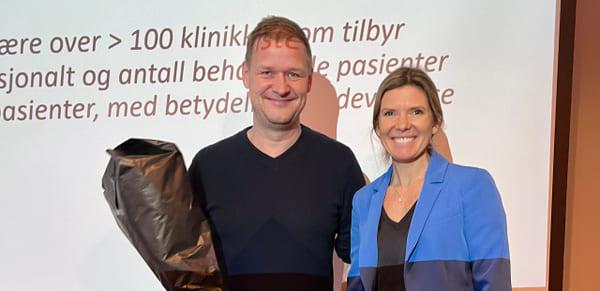 Bjarne Hansen and Ingrid Paasche, CEO of Kavli Trust, both smiling and looking toward the camera.