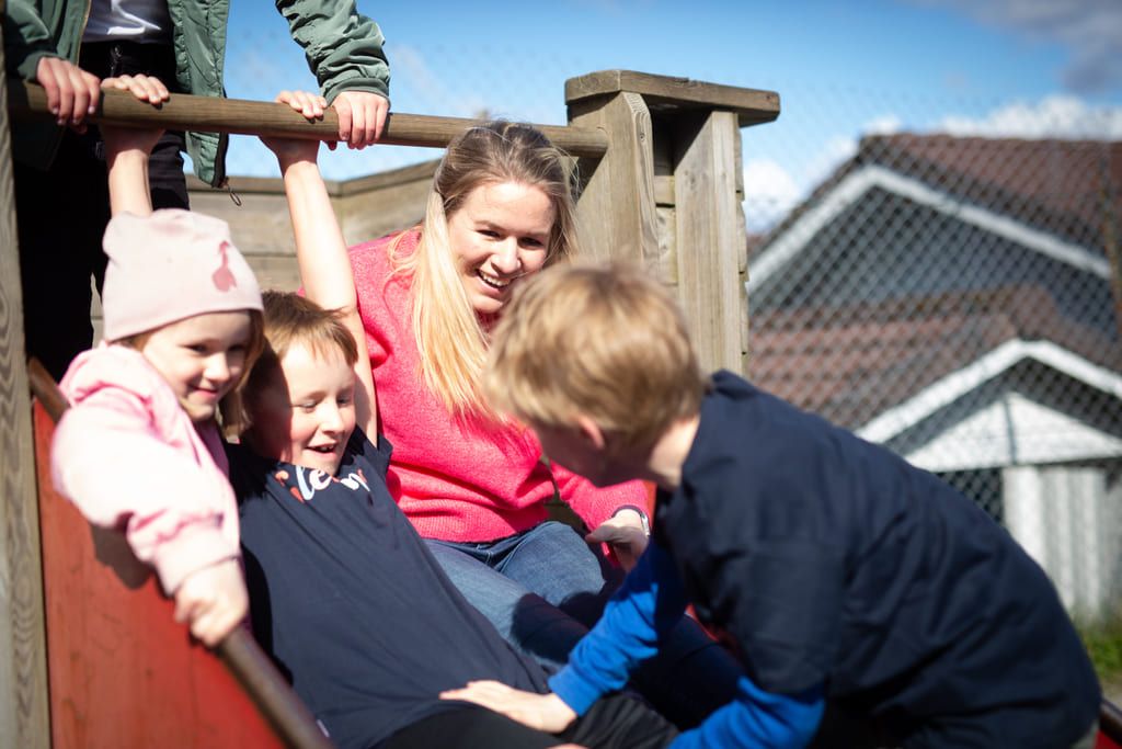 Gleding’s founder, Siri Abrahamsen, together with her children on a slide.