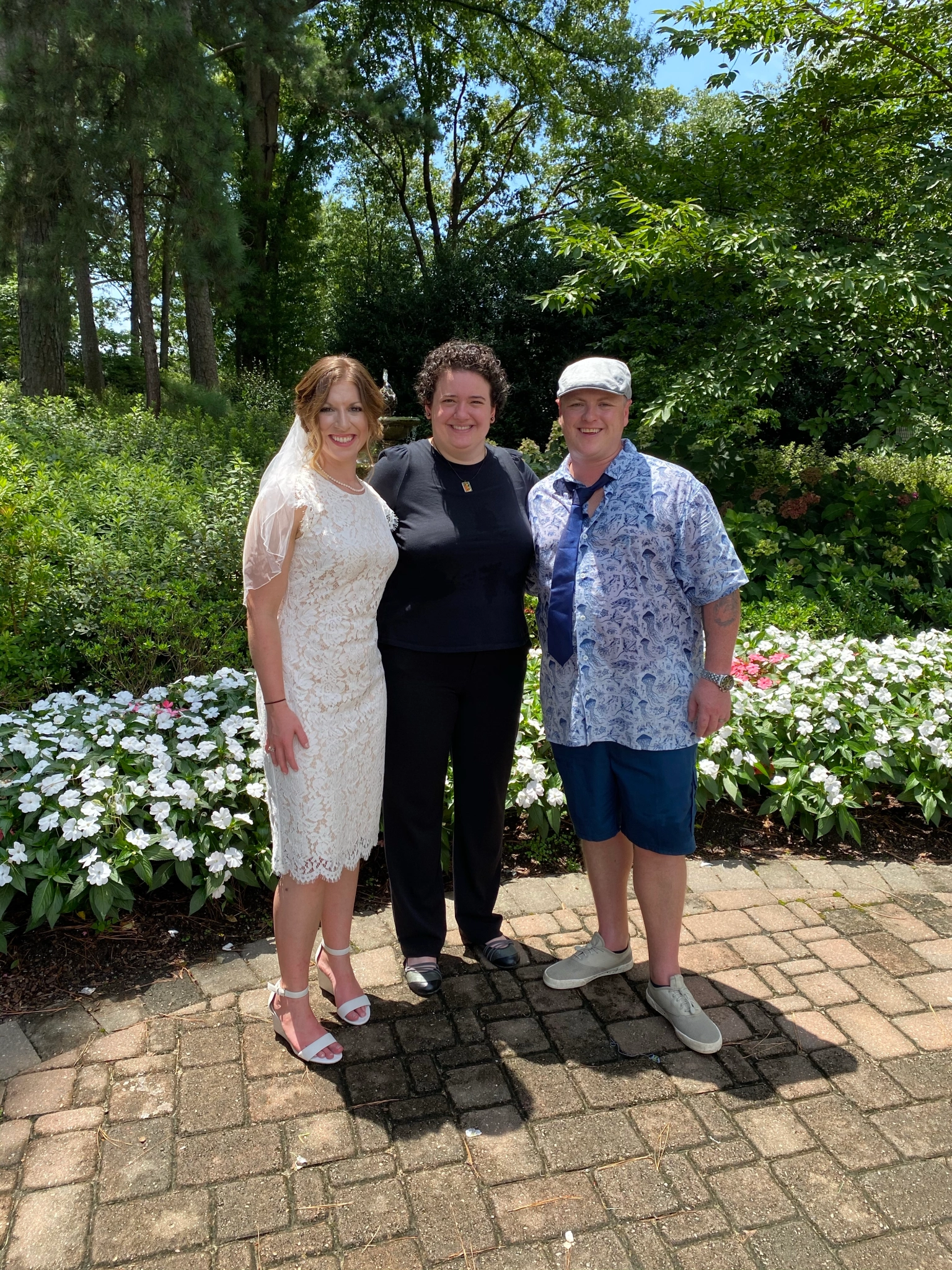 Stefanie, Carly, and Cas stand in the Azelea Gardens