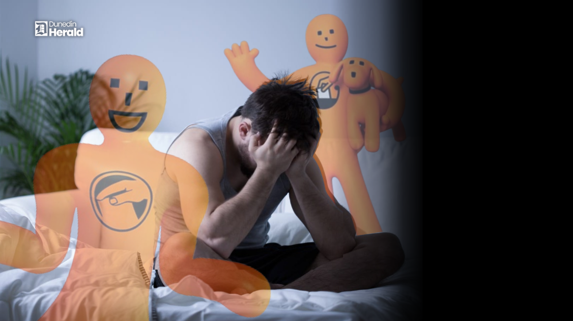 Man with head in hands surrounded by Orange Guys
