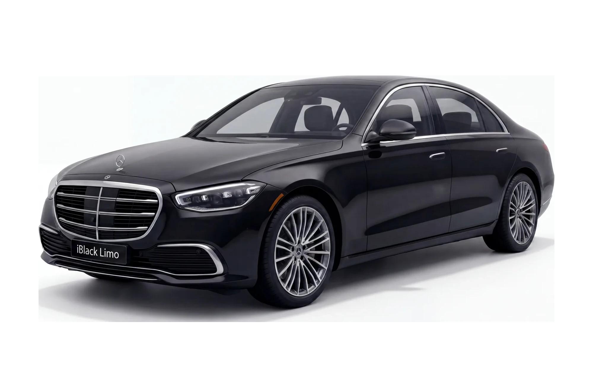Black Mercedes-Benz S-Class flagship sedan, front three-quarter studio view on white