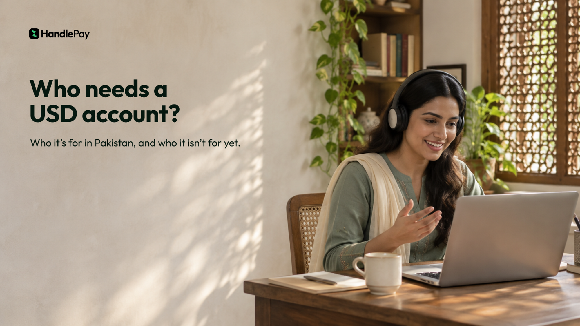 A Pakistani woman smiling on a work video call at her desk in a sunlit Lahore home study with a carved jali window, and the headline Who needs a USD account?