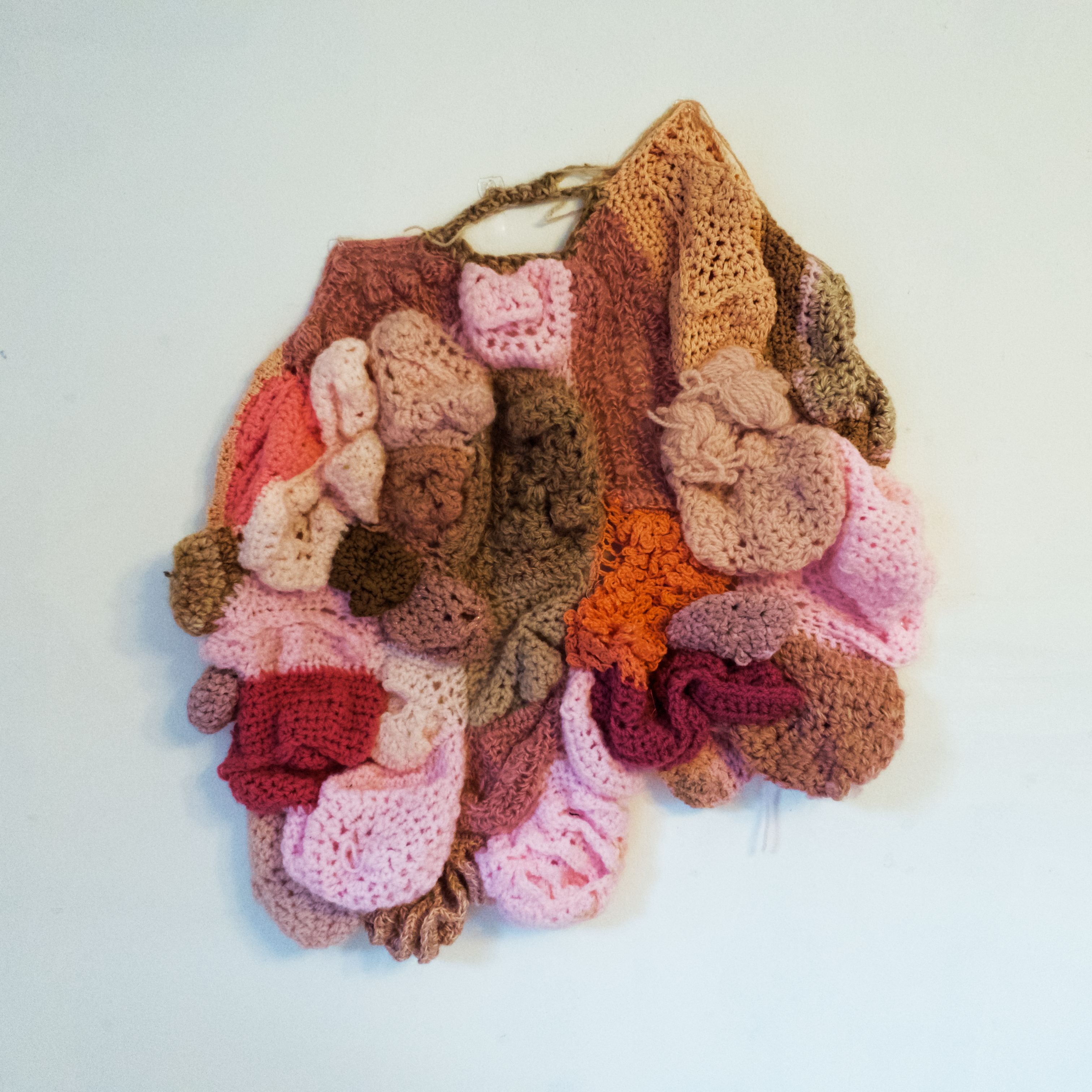 Textural crochet sculpture in flesh colours
