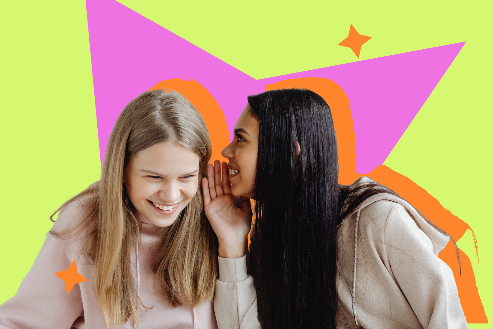 Two young women in pastel hoodies, one leaning in to whisper to the other against a bright graphic backdrop.