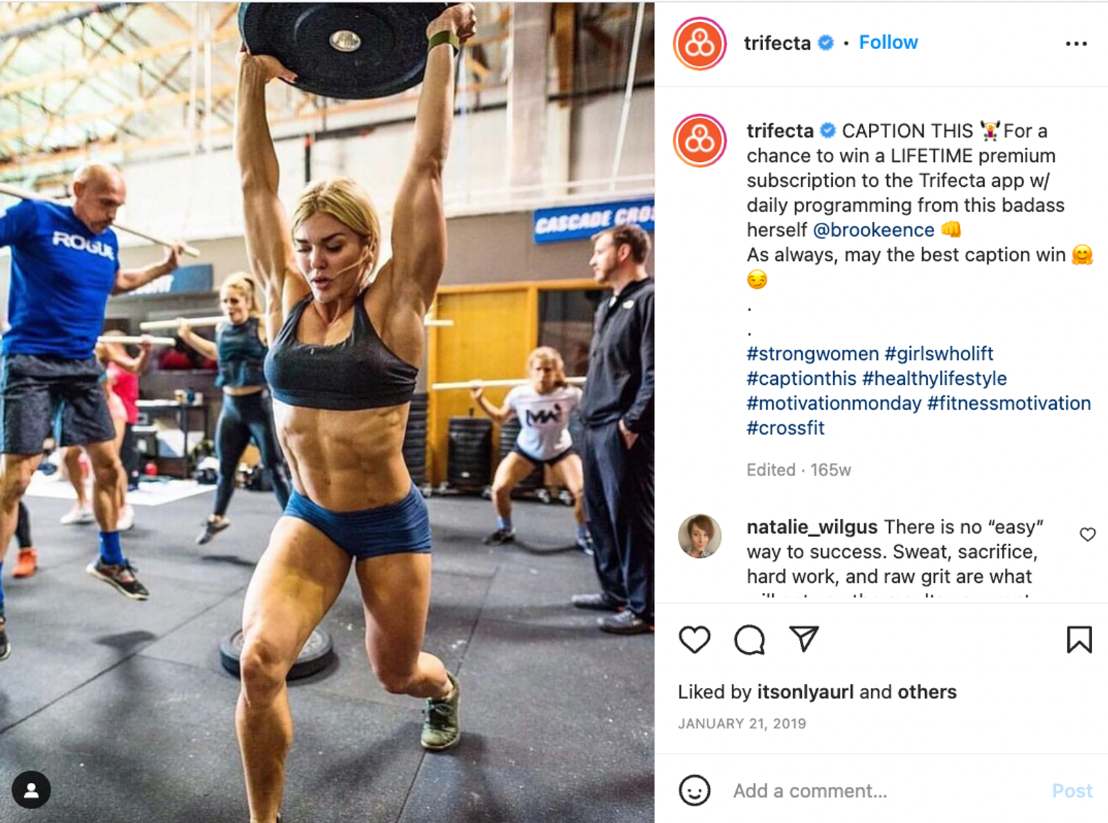 Instagram post from Trifecta with a caption contest, showing a woman lifting a barbell overhead in a gym.