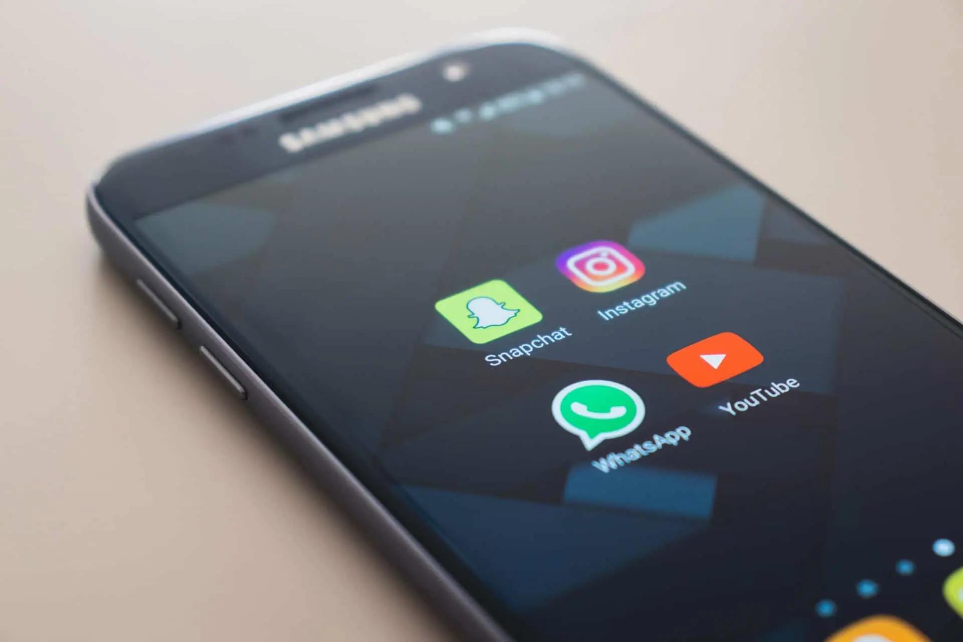 Instagram and YouTube logo on phone