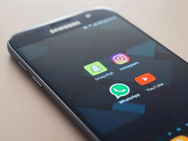 Instagram and YouTube logo on phone