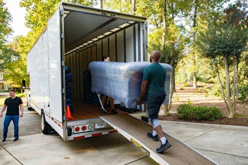 Mover loading boxes into a truck