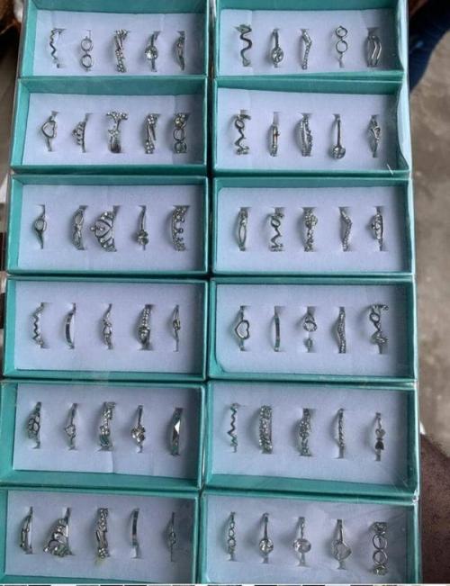 Silver and Gold Rings. 