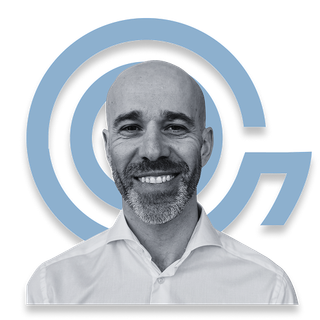 Peter Rajec with Glopcom logo