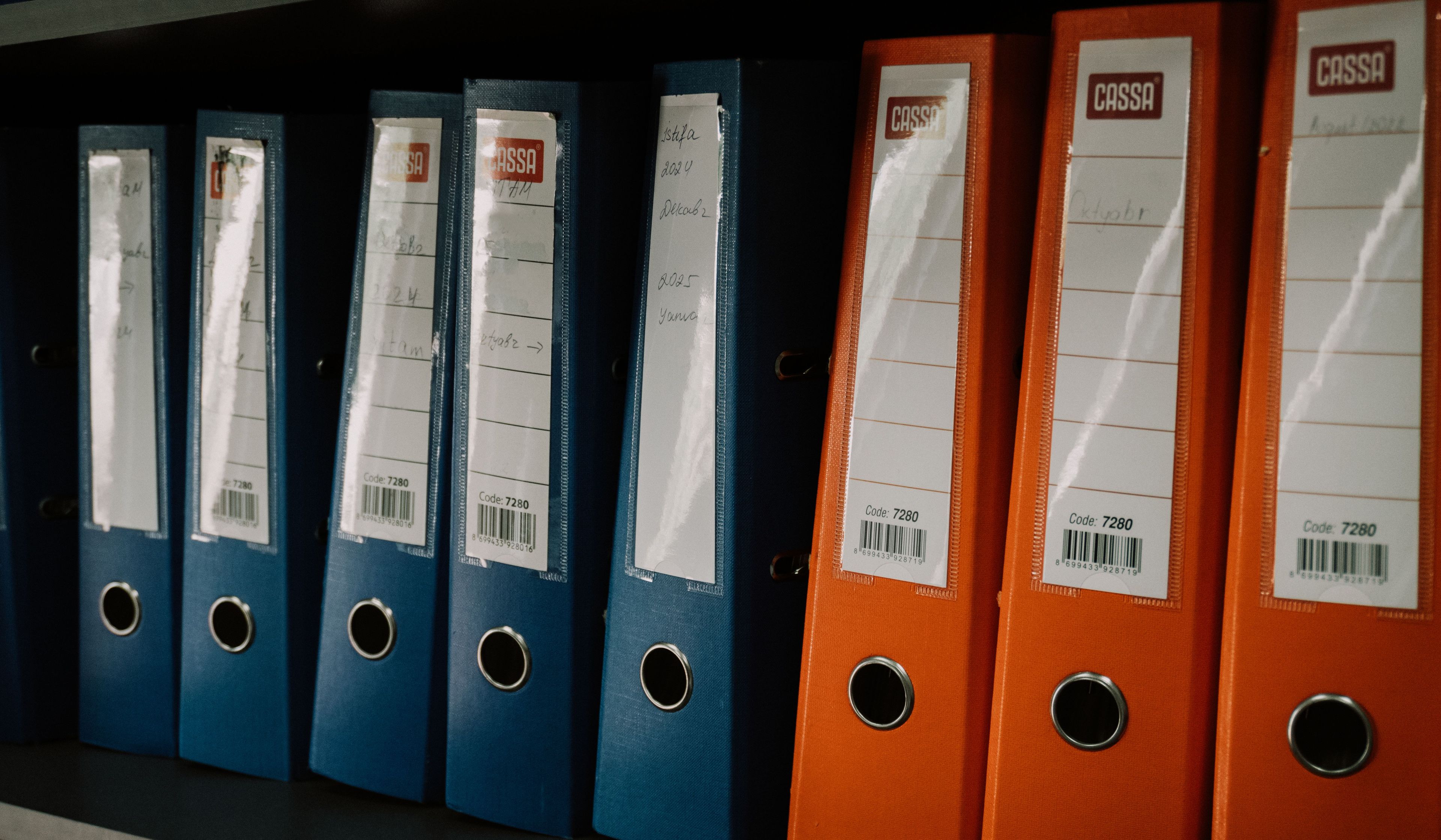 row of folder binders