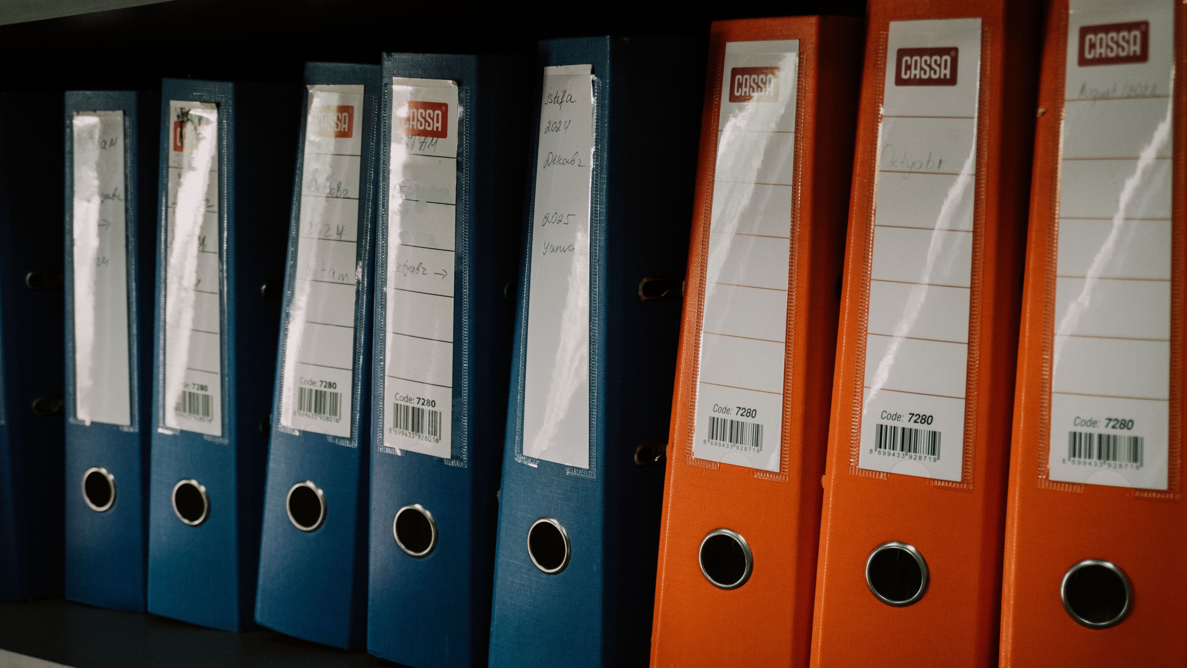 row of folder binders