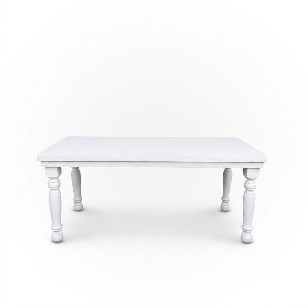 Mesa rectangular de madera con patas torneadas — Blanca