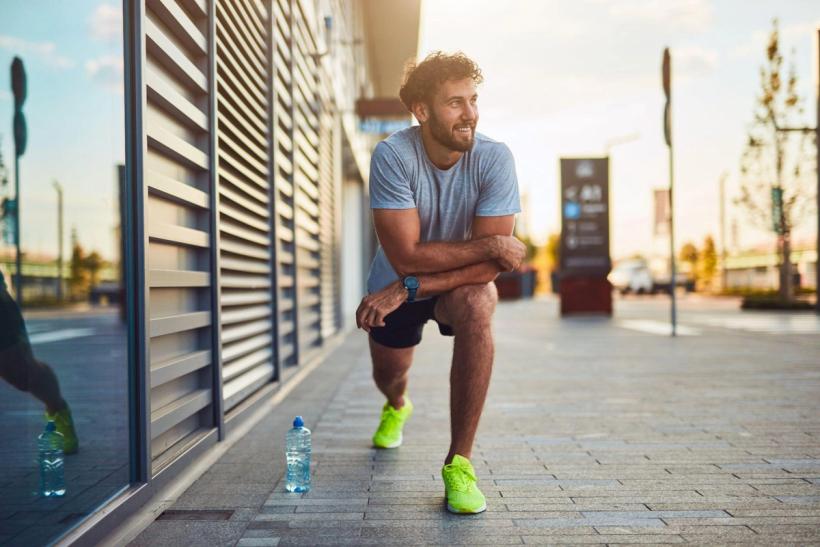 A man stretching before a run