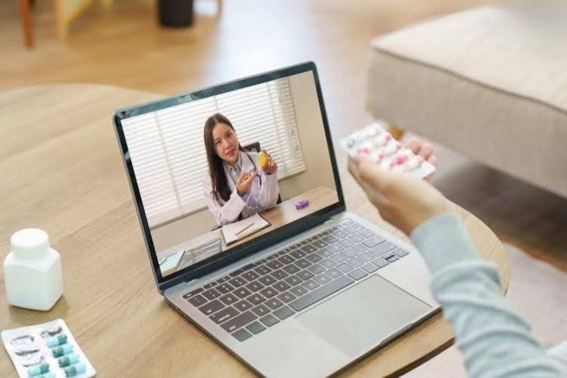 Patient discussing a prescription refill during an online consultation.