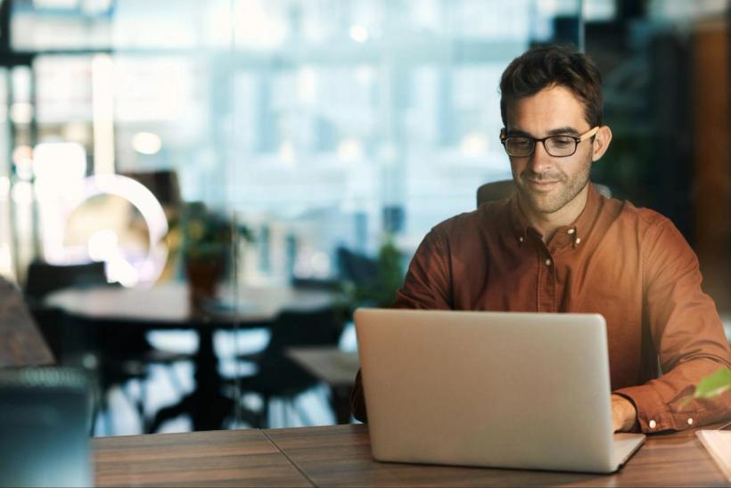 A man using his laptop
