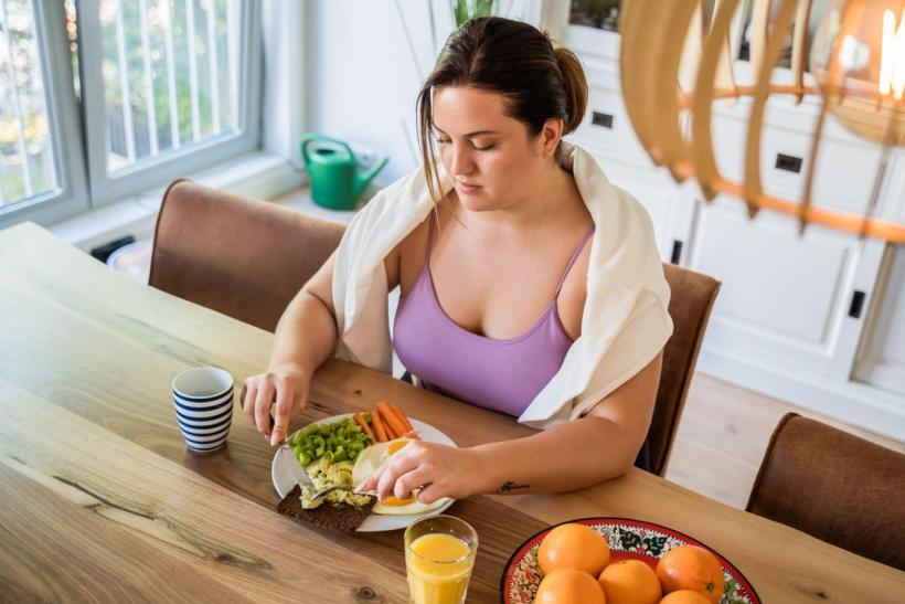 A woman eating a healthy meal