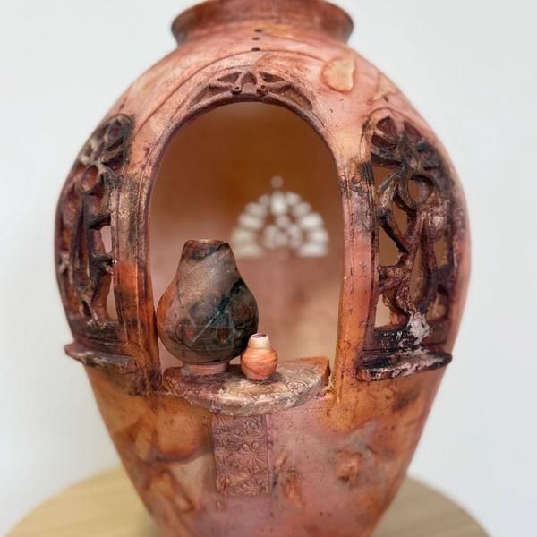 Enlighten, ceramic sculpture by Paula Bowie, available at Straddievarious Brisbane art gallery