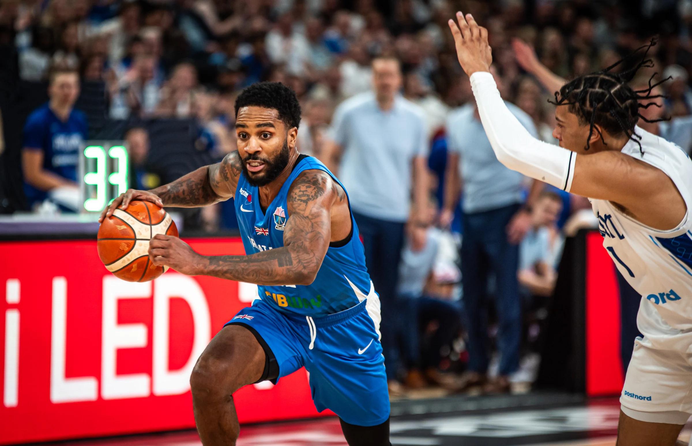 Tarik Phillip drives the ball against Finland at EuroBasket 2025