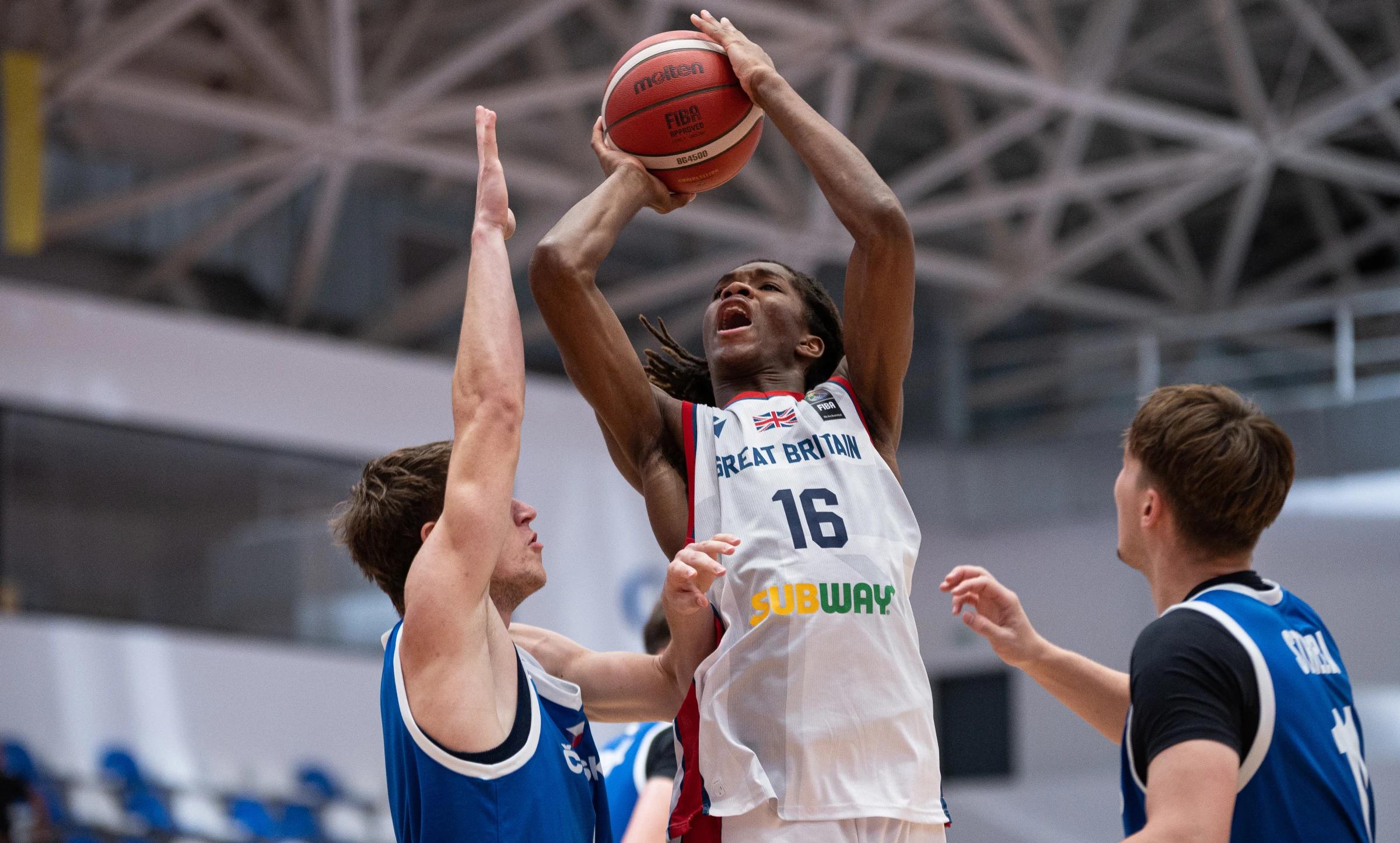 Emmanuel Ahamefule dives at the rim against Czechia