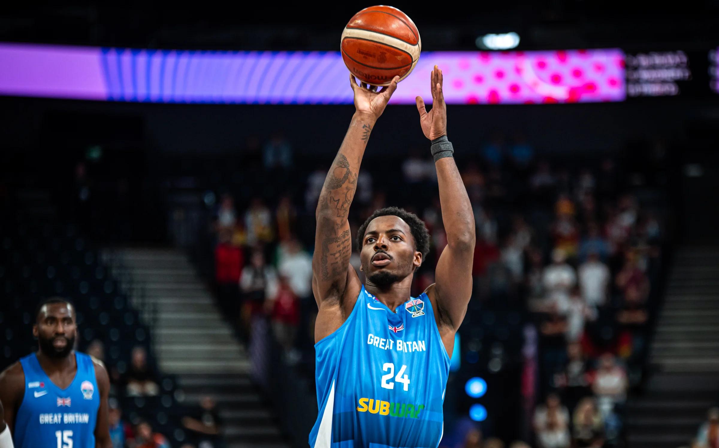 Carl Wheatle shoots a free throw against Germany