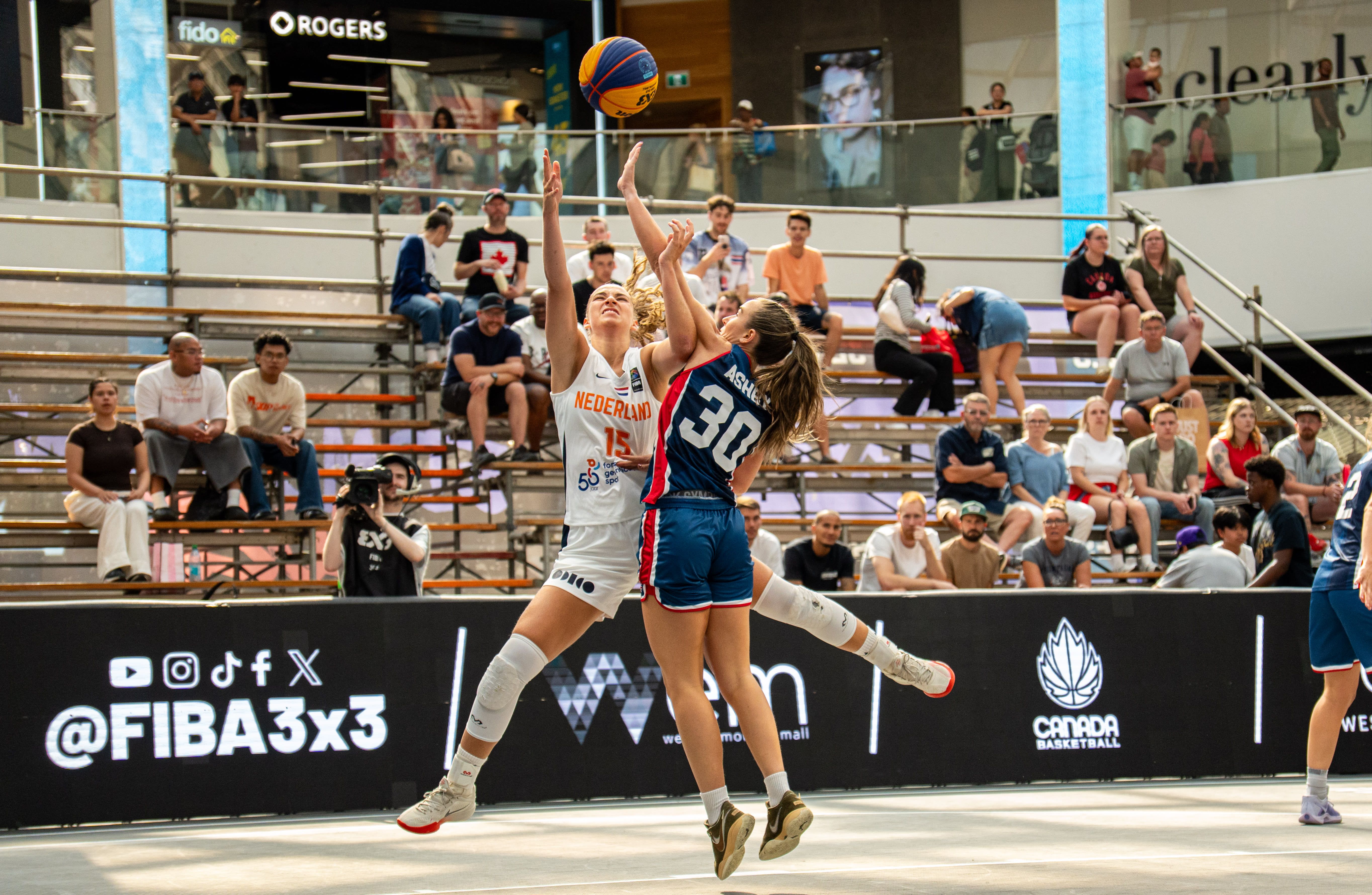 Ashby fights for the ball against the Netherlands