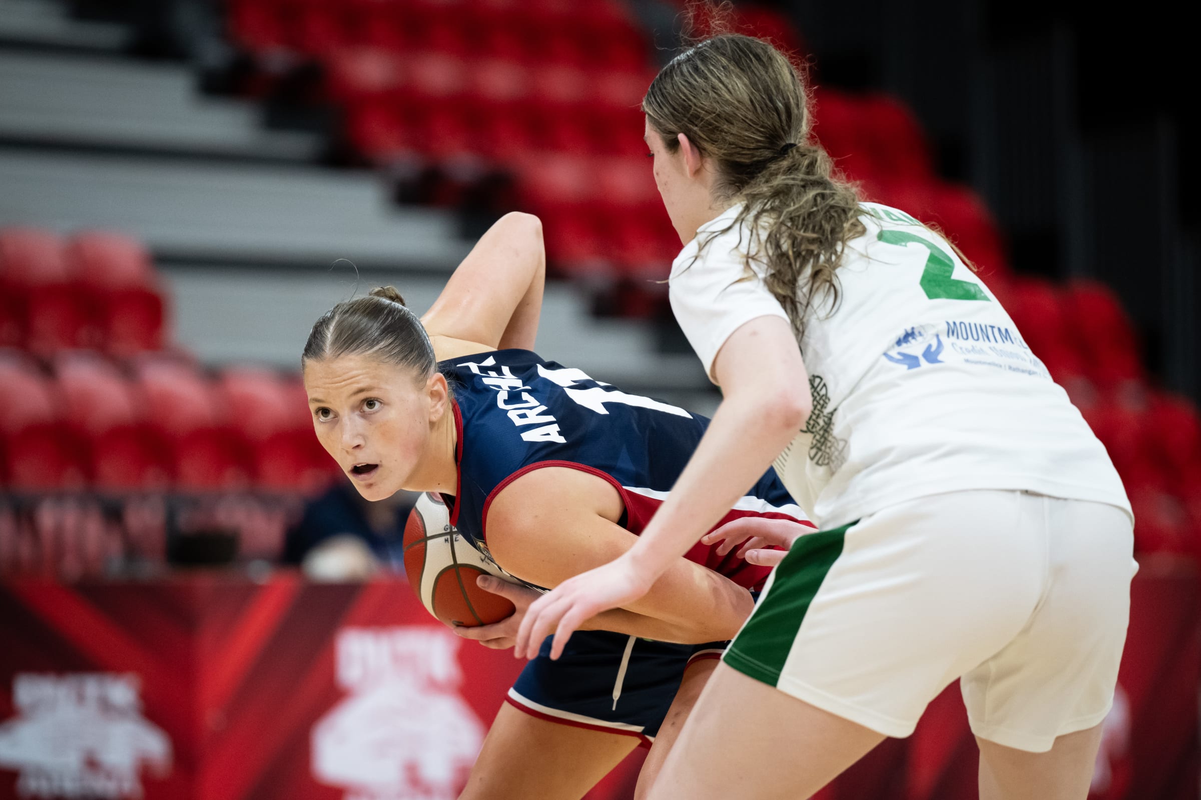 Elizabeth Archer holds the ball against Irelands