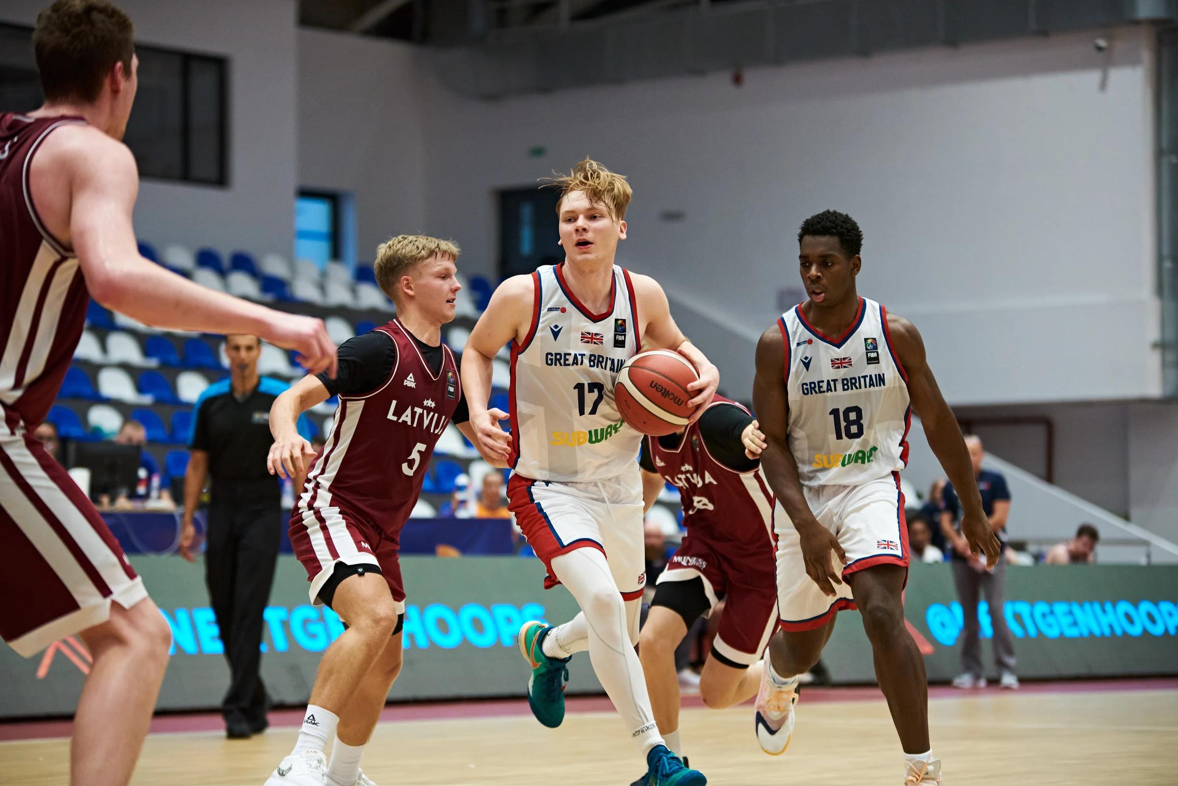 Nedas Cholevinskas dribbles for GB U20 at U20 EuroBasket 2024