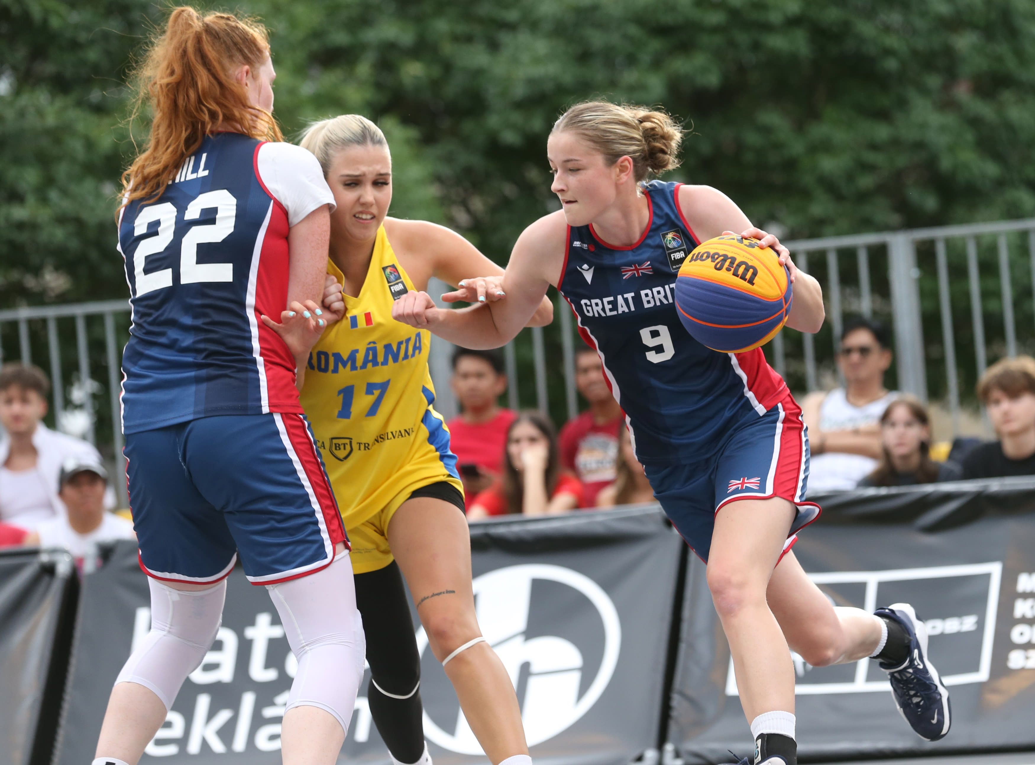 Ella Doherty drives the ball for GB with the Parker Hill screen