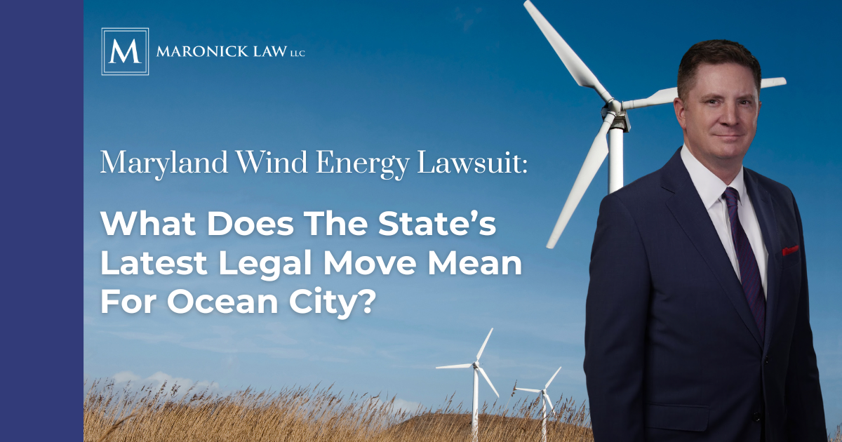 Blog graphic for Maronick Law LLC featuring attorney Thomas Maronick in a navy suit standing beside wind turbines against a blue sky, with text reading "Maryland Wind Energy Lawsuit: What Does the State's Latest Legal Move Mean for Ocean City?"