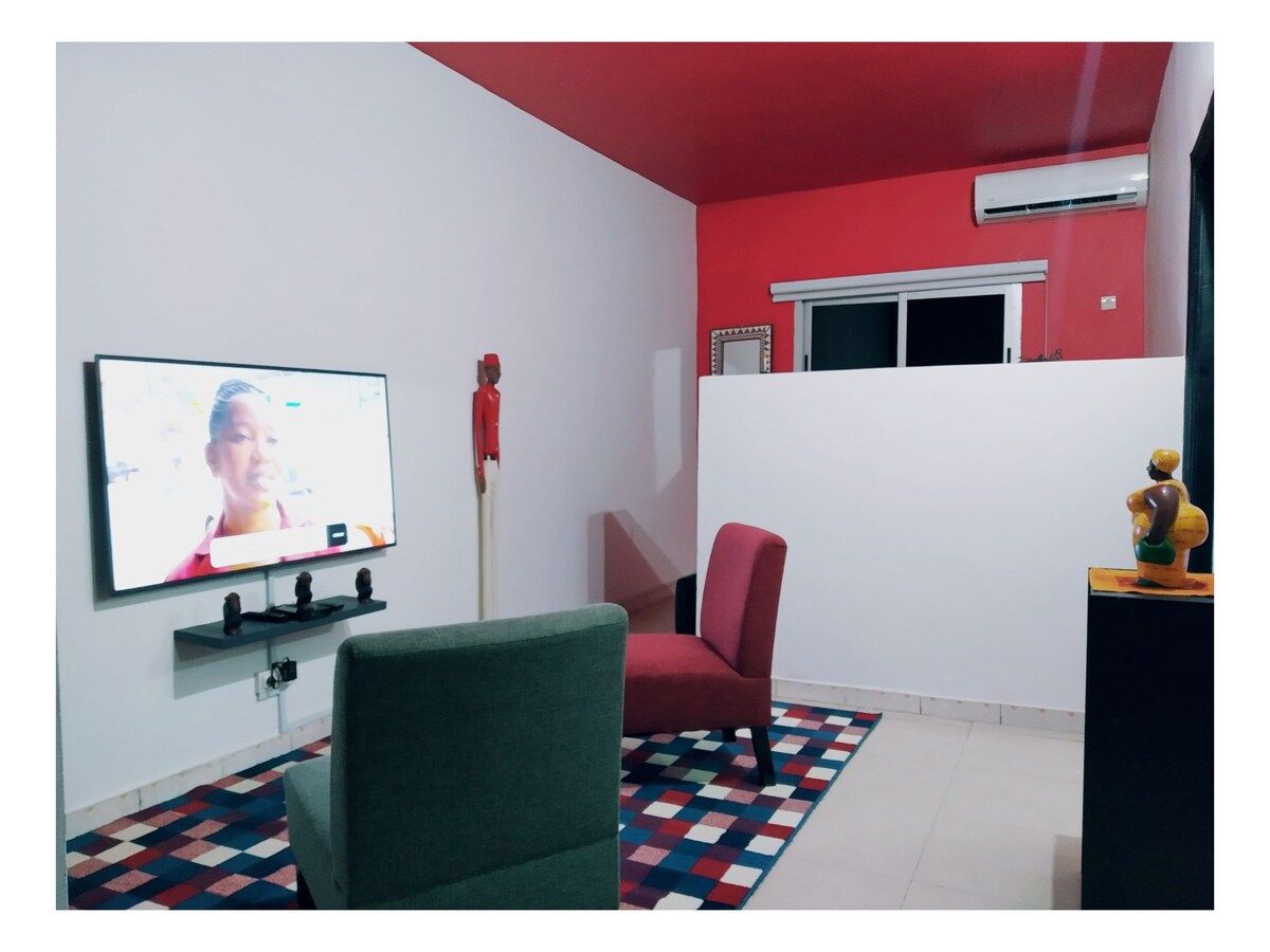 Espace salon et lit double