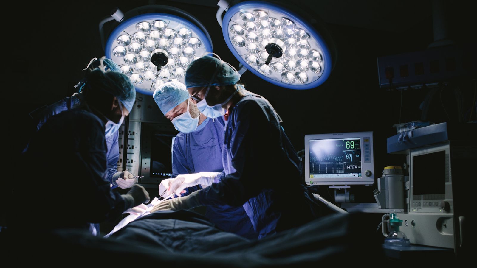 Surgeons doing an operation