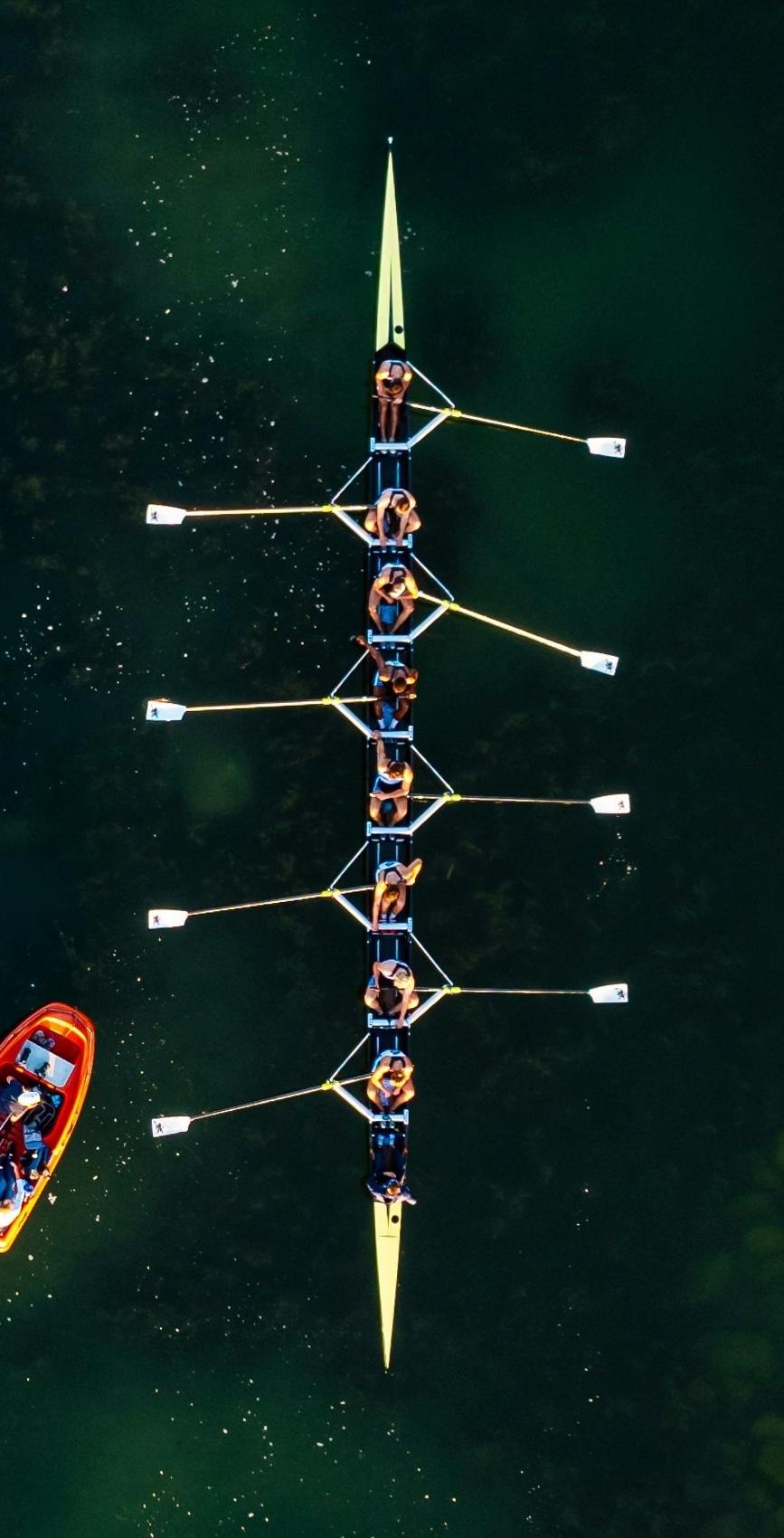 A rowing eight in step, seen from above.