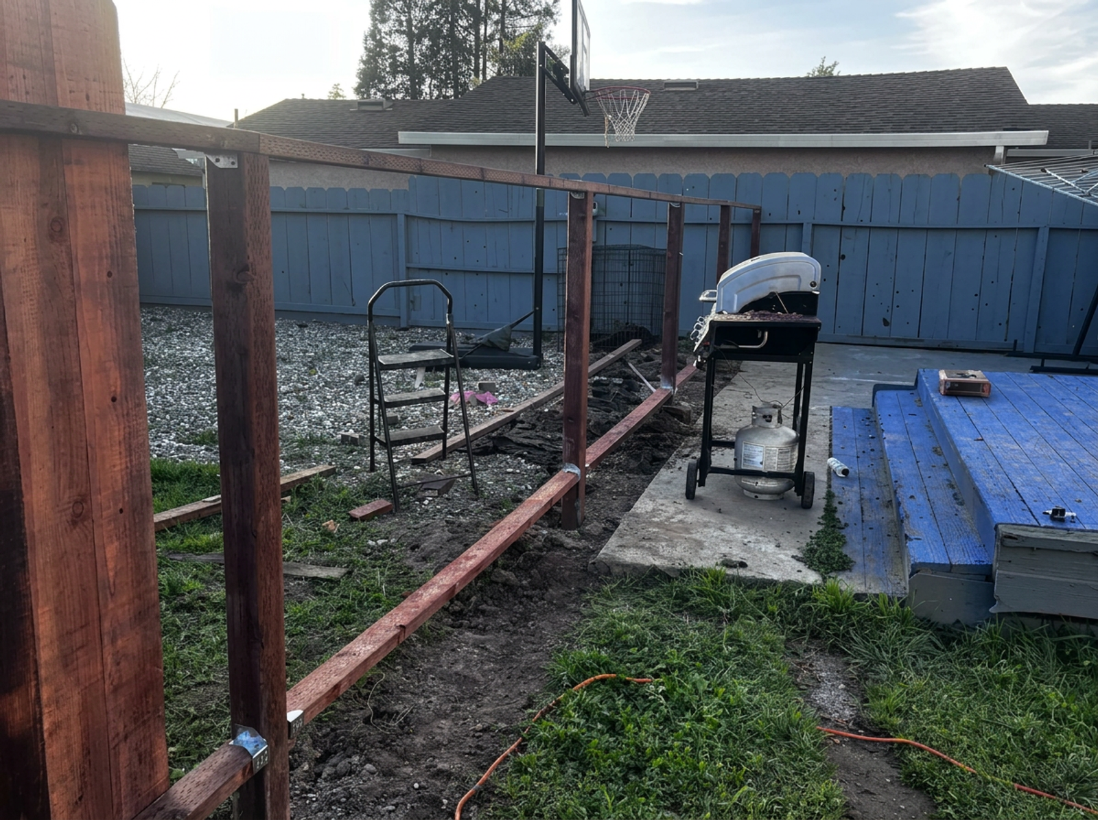 Backyard preparation before deck construction in a Watsonville home — before photo
