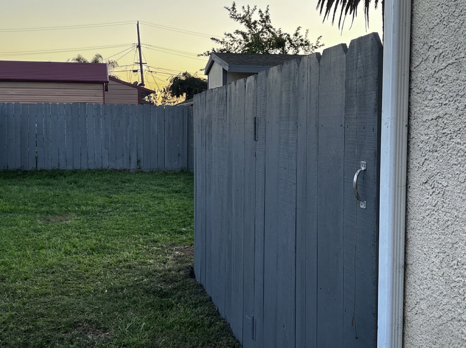 Backyard wood fence with matching custom gate in Watsonville, CA