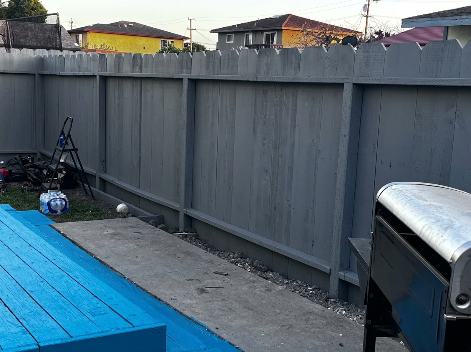 Wood fence construction in progress at a Watsonville residence