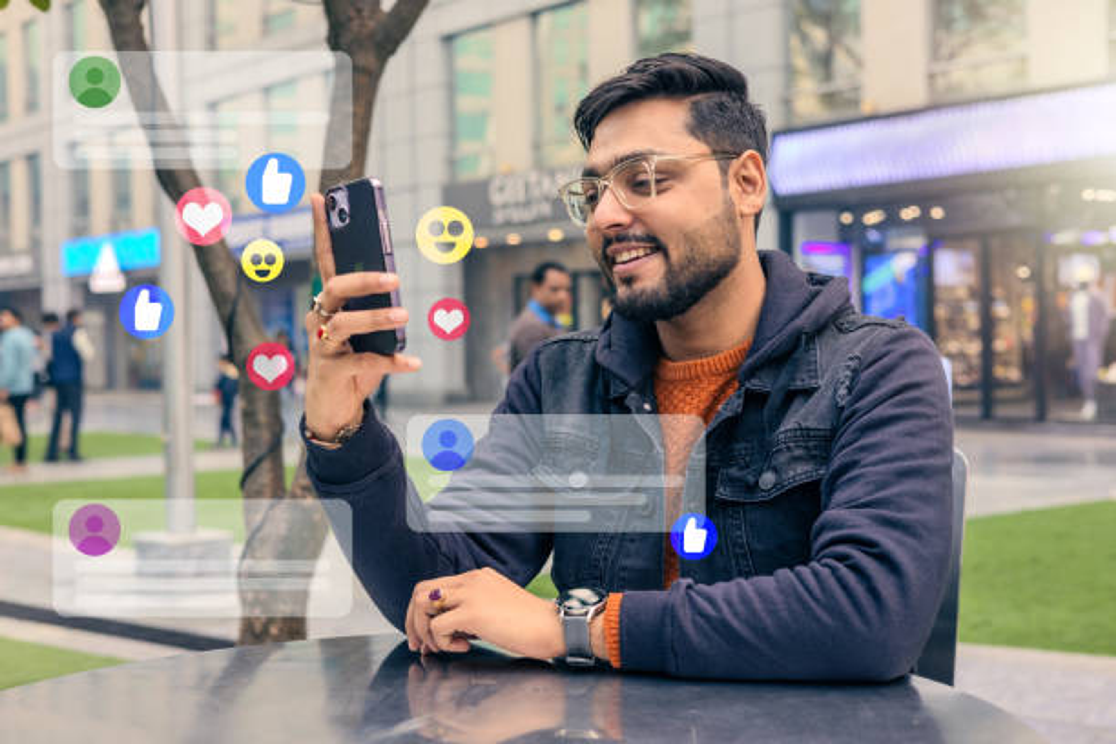 Man filming social media content on a phone