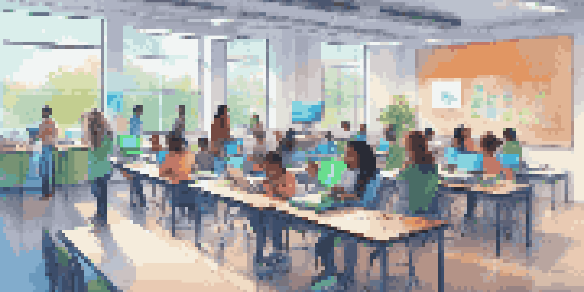 A modern classroom filled with diverse students using technology, including tablets and laptops, and an AI chatbot on a screen, in a brightly lit environment.